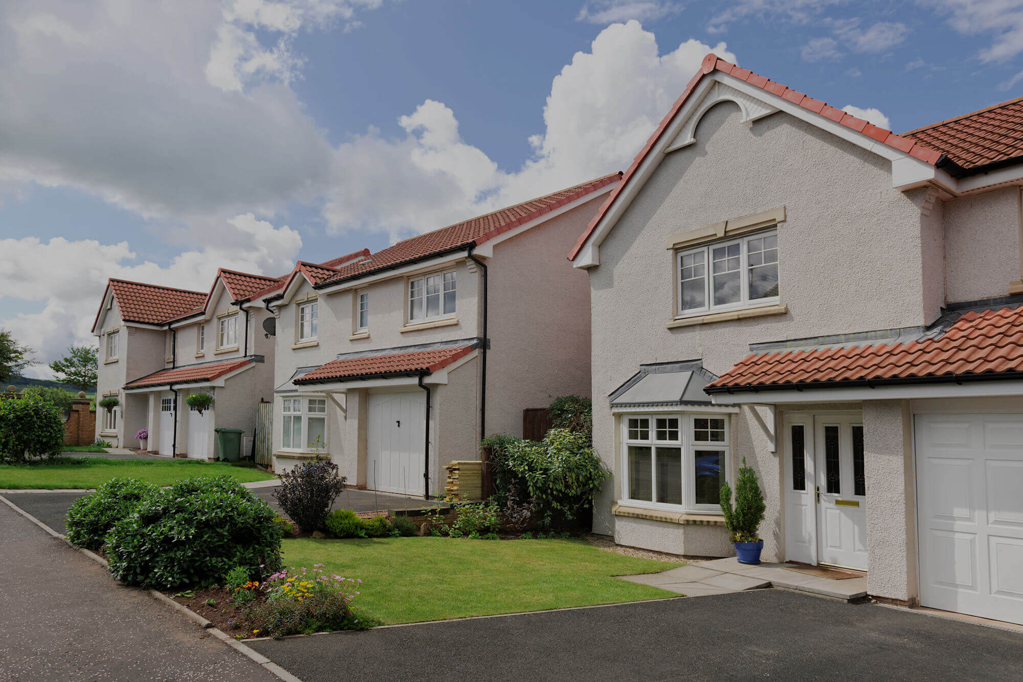 Photo of modern houses requiring an air tightness test